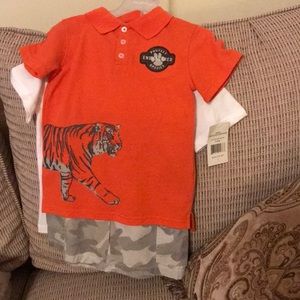 Includes 2 short sleeve shirts and shorts.